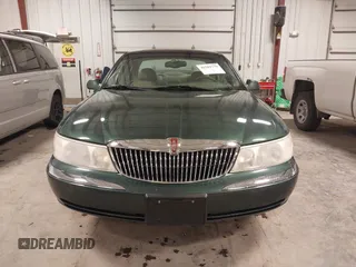 2001 Lincoln Continental with VIN 1LNHM97V11Y691910, listed as a IAAI auction lot 41501779 with 102,715 mi miles. Bid and sale history available at carsss.com. Image 12.