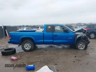 1998 Dodge Dakota SLT z VIN 1B7GG22YXWS683170, wystawiony jako IAAI lot #41903787 z przebiegiem Nie podano mil oraz . Historia ofert i sprzedaży dostępna na DreamBid. Obrazek 13.