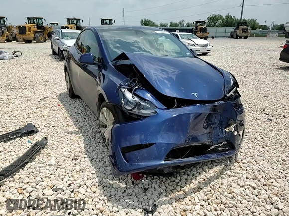 2022 Tesla Model Y Long Range z VIN 7SAYGDEE7NF313228, wystawiony jako Copart lot #55060705 z przebiegiem 32 238 mil mil oraz Szkoda całkowita • Salvage title. Historia ofert i sprzedaży dostępna na DreamBid. Obrazek 14.