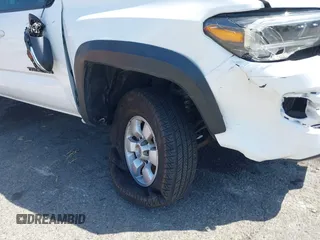 2023 Toyota Tacoma SR5 z VIN 3TMDZ5BN5PM148049, wystawiony jako IAAI lot #41648232 z przebiegiem 22 570 mil mil oraz . Historia ofert i sprzedaży dostępna na DreamBid. Obrazek 6.