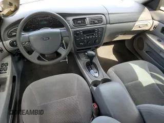2004 Ford Taurus SE with VIN 1FAFP53U24A137741, listed as a Copart auction lot 54313915 with 92,739 mi miles and Salvage Title. Bid and sale history available at DreamBid. Image 8.