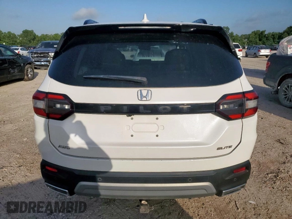 2023 Honda Pilot Elite z VIN 5FNYG1H86PB030033, wystawiony jako Copart lot #61843035 z przebiegiem 48 511 mil mil oraz Szkoda całkowita • Salvage title. Historia ofert i sprzedaży dostępna na DreamBid. Obrazek 6.