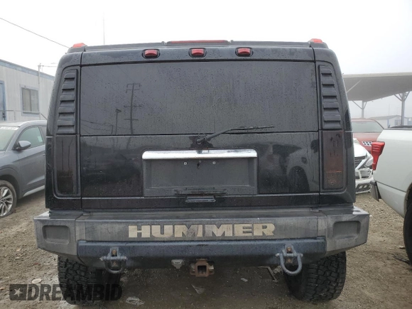 2003 Hummer H2 with VIN 5GRGN23U83H143843, listed as a Copart auction lot 43792915 with 115,569 mi miles and Salvage Title. Bid and sale history available at carsss.com. Image 6.