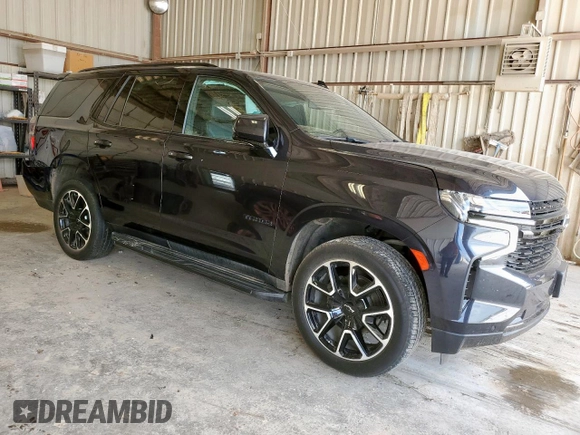 2023 Chevrolet Tahoe RST with VIN 1GNSCRKD5PR290351, listed as a Copart auction lot 58806595 with 64,909 mi miles and Salvage title. Bid and sale history available at DreamBid. Image 4.