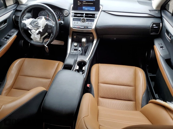 2021 Lexus NX 300 with VIN JTJDARBZ6M2184303, listed as a Copart auction lot 59742115 with 57,129 mi miles and Salvage title. Bid and sale history available at DreamBid. Image 8.