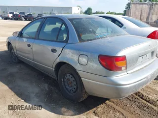 2002 Saturn SL z VIN 1G8ZH52832Z275788, wystawiony jako IAAI lot #42465553 z przebiegiem Nie podano mil oraz . Historia ofert i sprzedaży dostępna na DreamBid. Obrazek 3.