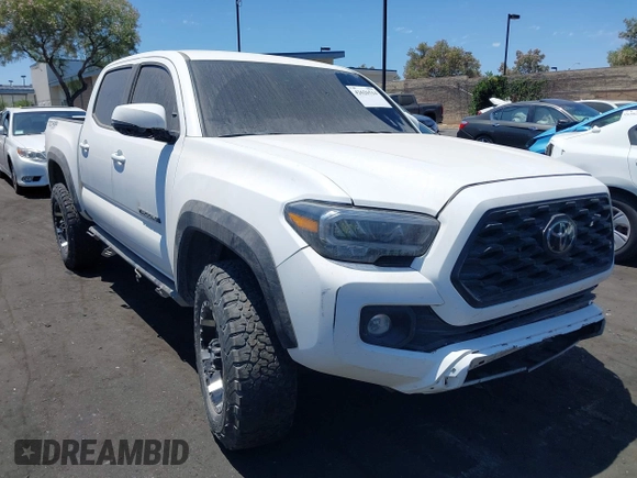 2023 Toyota Tacoma SR with VIN 3TMCZ5AN4PM558760, listed as a IAAI auction lot 42626514 with 39,335 mi miles and . Bid and sale history available at DreamBid. Image 1.