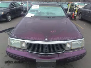 1994 Lincoln Continental with VIN 1LNLM9840RY602663, listed as a IAAI auction lot 31711429 with 90,889 mi miles and . Bid and sale history available at DreamBid. Image 6.