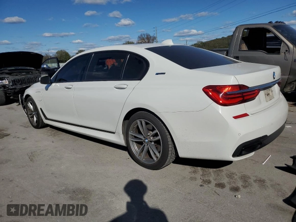 2018 BMW 7 Series 740e xDrive iPerformance with VIN WBA7J2C50JG938424, listed as a Copart auction lot 76085784 with 90,316 mi miles and Salvage Title. Bid and sale history available at carsss.com. Image 2.