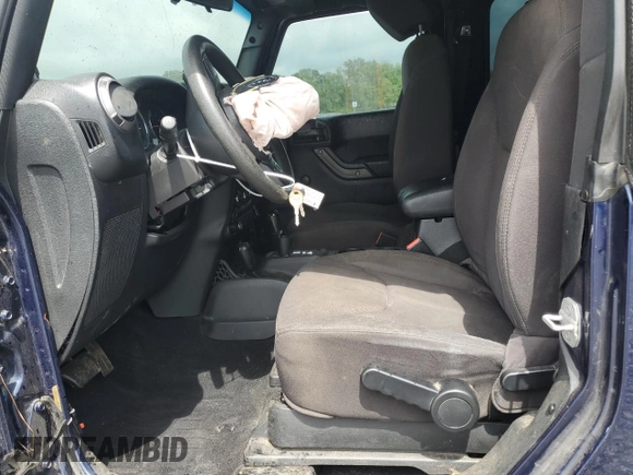 2013 Jeep Wrangler Sport with VIN 1C4AJWAG6DL590922, listed as a Copart auction lot 53379755 with 139,099 mi miles and Salvage title. Bid and sale history available at DreamBid. Image 7.