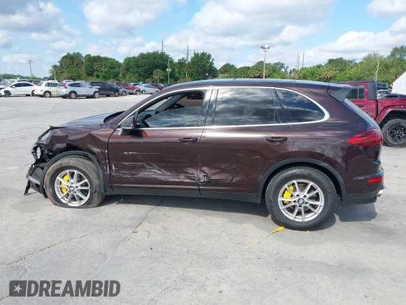 2015 Porsche Cayenne Diesel with VIN WP1AF2A26FLA44086, listed as a IAAI auction lot 42029799 with 124,723 mi miles and . Bid and sale history available at DreamBid. Image 14.
