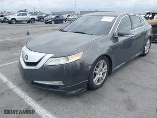2009 Acura TL Tech with VIN 19UUA86519A014157, listed as a IAAI auction lot 42058423 with 201,403 mi miles. Bid and sale history available at carsss.com. Image 2.