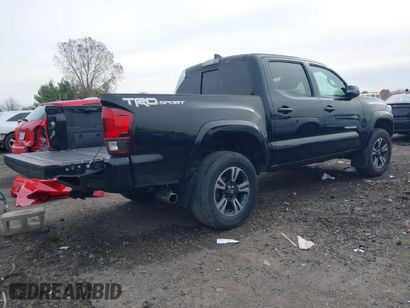 2018 Toyota Tacoma SR5 with VIN 3TMAZ5CN6JM055632, listed as a IAAI auction lot 40751593 with 125,663 mi miles and . Bid and sale history available at DreamBid. Image 4.