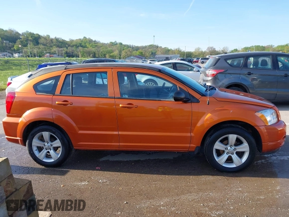 2011 Dodge Caliber Mainstreet z VIN 1B3CB3HA5BD297950, wystawiony jako IAAI lot #42073342 z przebiegiem 155 421 mil mil oraz . Historia ofert i sprzedaży dostępna na DreamBid. Obrazek 13.