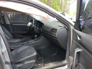 2020 Volkswagen Jetta SEL z VIN 3VWE57BU9LM082552, wystawiony jako IAAI lot #42091492 z przebiegiem 60 775 mil mil oraz . Historia ofert i sprzedaży dostępna na DreamBid. Obrazek 5.