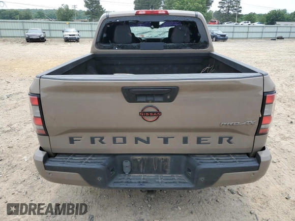2023 Nissan Frontier Pro-4X with VIN 1N6ED1EK0PN617872, listed as a Copart auction lot 57125435 with 97,981 mi miles and Salvage title. Bid and sale history available at DreamBid. Image 6.