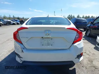 2017 Honda Civic EX-T with VIN 2HGFC1E39HH644602, listed as a IAAI auction lot 41920127 with 102,360 mi miles and . Bid and sale history available at DreamBid. Image 17.