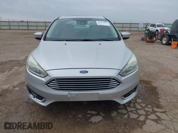 2017 Ford Focus Titanium with VIN 1FADP3J24HL229702, listed as a IAAI auction lot 42057013 with 120,250 mi miles and . Bid and sale history available at DreamBid. Image 12.