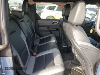 2024 Ford Bronco Big Bend z VIN 1FMDE7BH7RLA03788, wystawiony jako Copart lot #48574295 z przebiegiem 10 597 mil mil oraz Szkoda całkowita • Salvage title. Historia ofert i sprzedaży dostępna na DreamBid. Obrazek 11.
