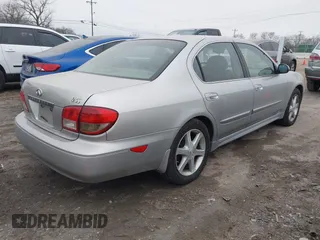2004 Infiniti I35 with VIN JNKDA31A04T212973, listed as a IAAI auction lot 41495760 with 143,328 mi miles. Bid and sale history available at carsss.com. Image 4.