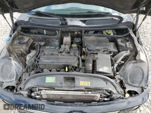 2005 MINI Convertible with VIN WMWRF33485TG11549, listed as a Copart auction lot 87285984 with 58,934 mi miles and Salvage title. Bid and sale history available at DreamBid. Image 11.