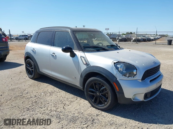 2014 MINI Countryman S with VIN WMWZC5C54EWP40882, listed as a IAAI auction lot 42633141 with 176,641 mi miles and . Bid and sale history available at DreamBid. Image 1.