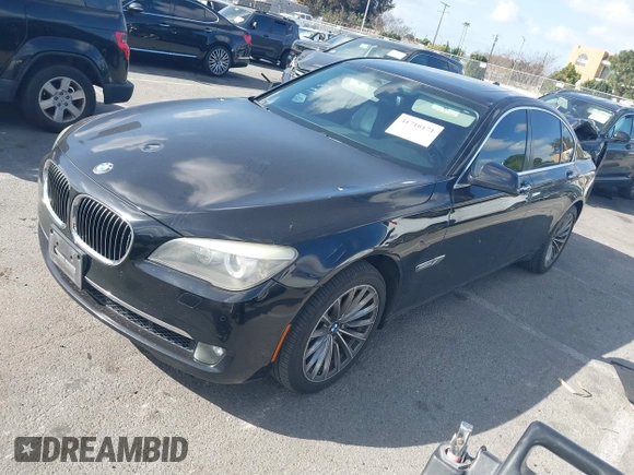 2012 BMW 7 Series 740i with VIN WBAKA4C5XCDS99253, listed as a IAAI auction lot 41710171 with 176,907 mi miles. Bid and sale history available at carsss.com. Image 2.
