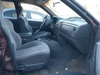 2001 Jeep Grand Cherokee Laredo with VIN 1J4GW48S11C578001, listed as a IAAI auction lot 41671318 with 263,694 mi miles. Bid and sale history available at carsss.com. Image 5.