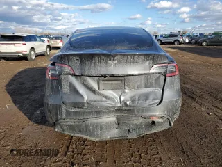 2022 Tesla Model Y Long Range with VIN 7SAYGDEE7NF386082, listed as a Copart auction lot 47191625 with 73,634 mi miles and Salvage Title. Bid and sale history available at carsss.com. Image 6.