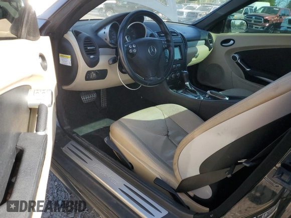 2006 Mercedes-Benz SLK-Class 3.0L with VIN WDBWK54F66F114895, listed as a Copart auction lot 55417885 with 128,984 mi miles and Salvage Title. Bid and sale history available at carsss.com. Image 8.