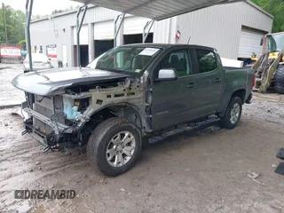 2018 Chevrolet Colorado 4WD LT z VIN 1GCGTCEN6J1146104, wystawiony jako IAAI lot #42338356 z przebiegiem 71 043 mil mil oraz . Historia ofert i sprzedaży dostępna na DreamBid. Obrazek 18.