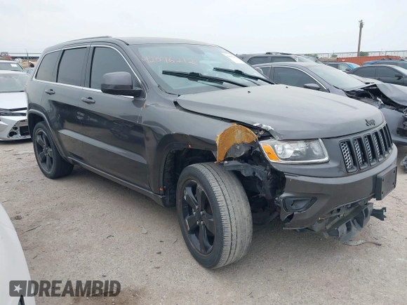 2015 Jeep Grand Cherokee Altitude with VIN 1C4RJEAG3FC219782, listed as a IAAI auction lot 42076212 with 194,910 mi miles. Bid and sale history available at carsss.com. Image 1.