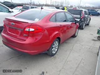 2012 Ford Fiesta SE with VIN 3FADP4BJ2CM158678, listed as a IAAI auction lot 41858203 with 144,458 mi miles. Bid and sale history available at carsss.com. Image 4.