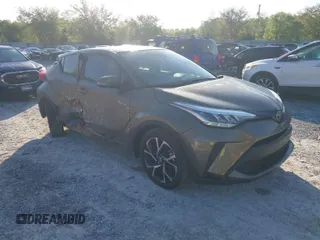 2021 Toyota C-HR LE with VIN NMTKHMBX0MR138934, listed as a IAAI auction lot 42005451 with 31,148 mi miles. Bid and sale history available at carsss.com. Image 1.
