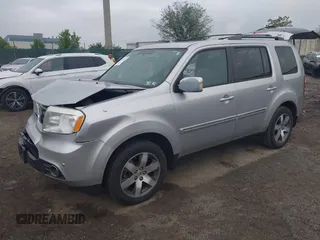 2013 Honda Pilot Touring z VIN 5FNYF4H96DB051005, wystawiony jako IAAI lot #42211189 z przebiegiem 215 594 mil mil oraz . Historia ofert i sprzedaży dostępna na DreamBid. Obrazek 2.