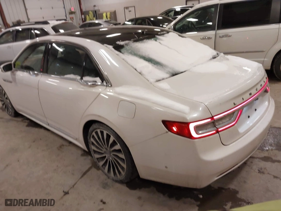 2017 Lincoln Continental Black Label with VIN 1LN6L9BC9H5637539, listed as a IAAI auction lot 41516006 with 163,223 mi miles. Bid and sale history available at carsss.com. Image 3.
