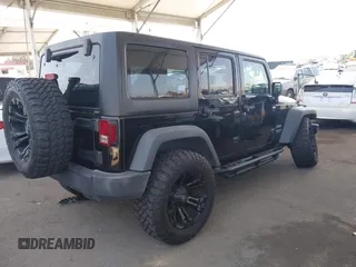 2016 Jeep Wrangler Unlimited Sport with VIN 1C4BJWDG7GL155900, listed as a IAAI auction lot 42380356 with 78,582 mi miles and . Bid and sale history available at DreamBid. Image 4.