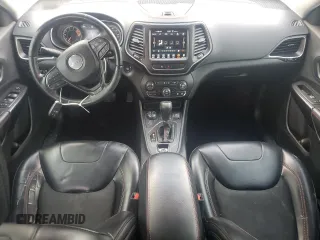 2019 Jeep Cherokee Trailhawk with VIN 1C4PJMBX9KD183116, listed as a Copart auction lot 58518265 with 124,258 mi miles and Salvage title. Bid and sale history available at DreamBid. Image 8.