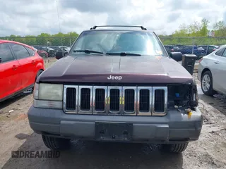 1997 Jeep Grand Cherokee Laredo with VIN 1J4GZ58S4VC702040, listed as a IAAI auction lot 42165536 with 121,803 mi miles and . Bid and sale history available at DreamBid. Image 13.