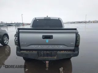 2020 Toyota Tacoma SR5 z VIN 3TMCZ5AN9LM290069, wystawiony jako IAAI lot #41938380 z przebiegiem 131 439 mil mil oraz . Historia ofert i sprzedaży dostępna na DreamBid. Obrazek 16.