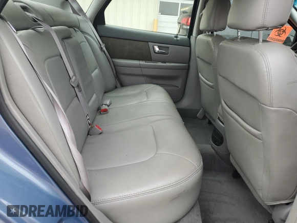 2000 Ford Taurus SEL with VIN 1FAFP56S2YG160062, listed as a Copart auction lot 82297744 with 97,218 mi miles and Salvage title. Bid and sale history available at DreamBid. Image 10.
