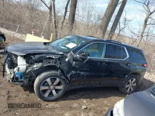 2018 Chevrolet Traverse LT z VIN 1GNEVHKWXJJ199472, wystawiony jako IAAI lot #41499911 z przebiegiem 129 127 mil mil oraz . Historia ofert i sprzedaży dostępna na DreamBid. Obrazek 14.