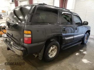 2004 GMC Yukon SLE with VIN 1GKEK13Z44J123899, listed as a Copart auction lot 86372974 with 201,093 mi miles and Salvage Title. Bid and sale history available at carsss.com. Image 3.