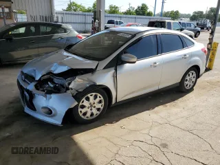 2012 Ford Focus SE with VIN 1FAHP3F29CL161559, listed as a Copart auction lot 61695575 with 127,412 mi miles and Salvage title. Bid and sale history available at DreamBid. Image 1.