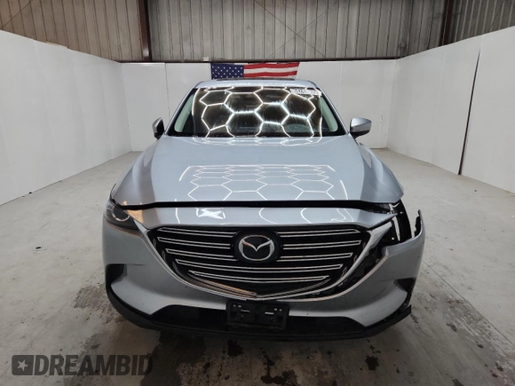 2023 Mazda CX-9 Touring with VIN JM3TCBCY9P0656636, listed as a Copart auction lot 64243905 with 59,788 mi miles and Non repairable. Bid and sale history available at DreamBid. Image 5.