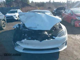 2023 Tesla Model S Plaid with VIN 5YJSA1E64PF512509, listed as a IAAI auction lot 41086678 with Not provided miles and . Bid and sale history available at DreamBid. Image 12.