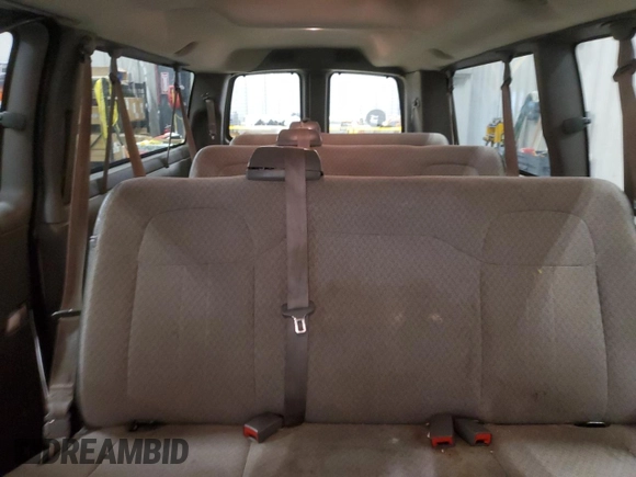 2014 Chevrolet Express Passenger LT with VIN 1GAZG1FG4E1176590, listed as a Copart auction lot 83660024 with 167,653 mi miles and Salvage title. Bid and sale history available at DreamBid. Image 10.