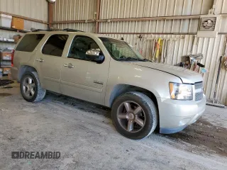 2014 Chevrolet Tahoe LT with VIN 1GNSCBE04ER108507, listed as a Copart auction lot 60931255 with 167,098 mi miles and Salvage title. Bid and sale history available at DreamBid. Image 4.