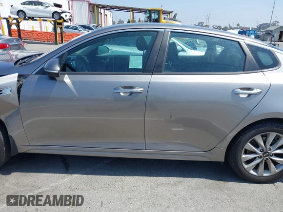 2018 Kia Optima S with VIN 5XXGT4L34JG263479, listed as a IAAI auction lot 42675426 with Not provided miles and . Bid and sale history available at DreamBid. Image 13.