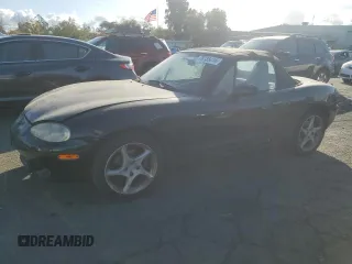 2001 Mazda MX-5 Miata with VIN JM1NB353610207157, listed as a Copart auction lot 78738414 with 108,414 mi miles and Salvage Title. Bid and sale history available at DreamBid. Image 1.